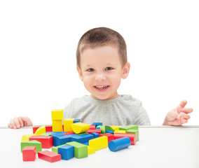 Child Playing Toys Blocks. Isolated White Background.