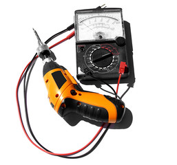 Voltmeter and drill on the white background