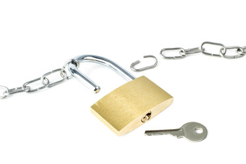 Broken metal chain, unlocked padlock showing keyhole and a key, isolated on white background