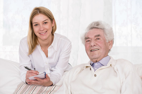 Care assistant and elder man