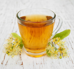 Cup of herbal tea with linden flowers
