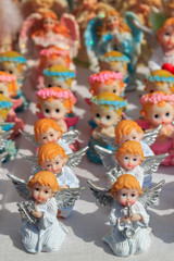 Figurines of angels on a market in Poland