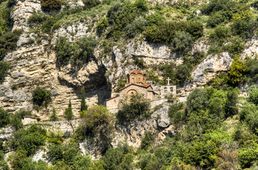 Fototapeta na wymiar Church at the side of a hill in Berat, Albania 