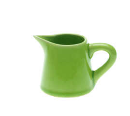 green teapot isolated on white background