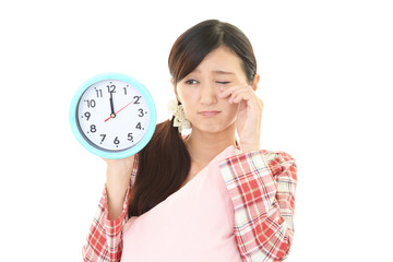 疲れた表情の女性
