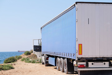 truck on a parking on a seashore