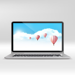 Vector laptop computer with sky in screen and hot air balloon.Realistic illustration. 