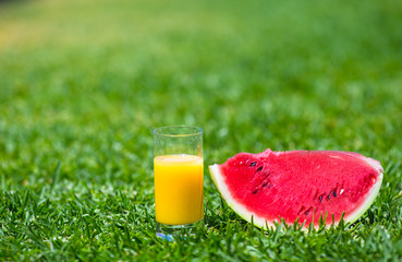 Summer and fresh theme: red ripe slice watermelon and glass of