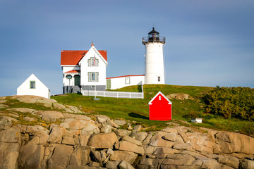 Fototapeta na wymiar Maine Lighthouse under Dusky Blue Sky