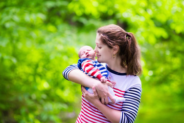 Fototapeta premium Mother and baby in a park