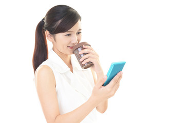 Fototapeta premium コーヒーを飲み寛ぐ女性