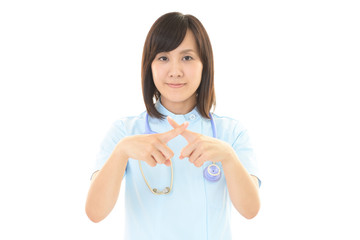 禁止の意思表示をする看護師