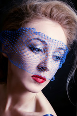 young beautiful blue-eyed women in veils