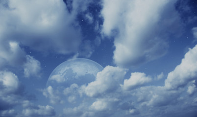 Naklejka na ściany i meble Planet in cloudy sky