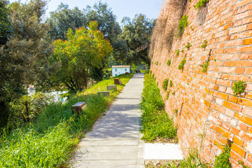 paved path along the wall of a medieval fortress