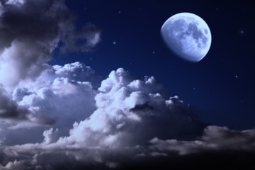 Fototapeta na wymiar night sky with the moon, clouds and stars