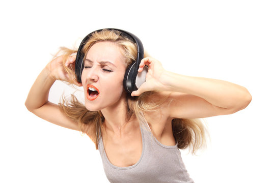  young woman singing with headphones