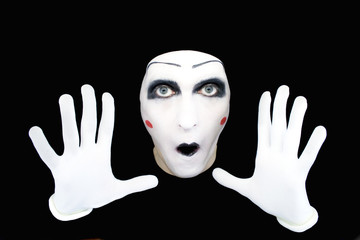 Portrait of the mime in white gloves