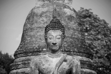 Black and White. Ancient Buddha Statue at Sukhothai historical park, Mahathat Temple ,Thailand.