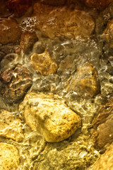 Water flowing in stones