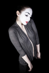 Sad woman  mime on  black background