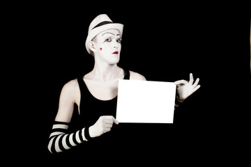 .mime holding a white blank