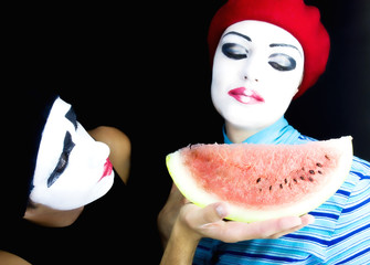 Mimes and a water-melon