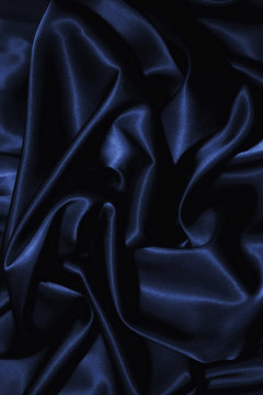 texture of a dark blue silk