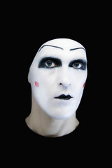 cheerful mime in white gloves