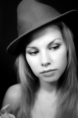 young fair-haired woman in  hat