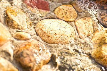 Water flowing in stones