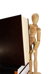Wooden dummy with books