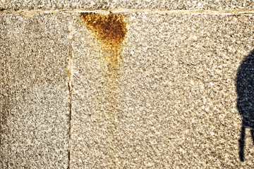  stone wall with rust stains