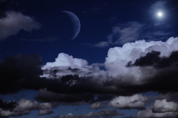 Obraz na płótnie Canvas night sky with the moon, clouds and stars
