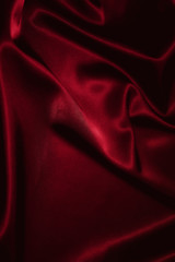 Texture of a red silk closeup