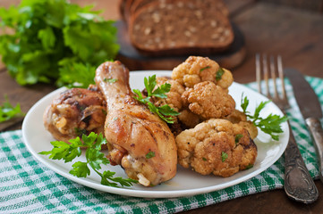 Chicken leg with baked cauliflower and parsley