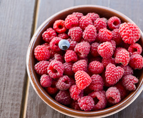 Fresh raspberries in plate