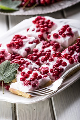 Red currant sponge cake. Plate with Assorted summer berries, raspberries, strawberries, cherries, currants, gooseberries 
