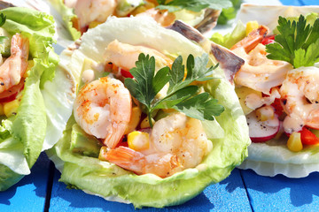 Shrimp salad on a blue background