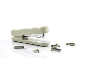 White Stapler with staples wires.