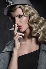 Obraz premium Beauty portrait of woman in military clothes