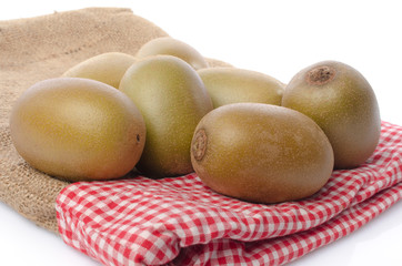 Fresh kiwi on burlap bag