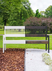 Black and white design bench in the park.
