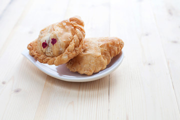 Curry puff stuffed with chicken with shallow DOF