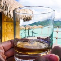 relaxing on summer vacations with drink in hand