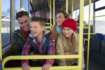 Happy family on the bus © dglimages