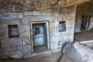 Fototapeta na wymiar Temple of the Moon in Machu Picchu, Peruvian Historical Sanctua