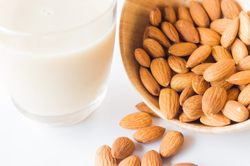 Almond milk and grain on white kitchen table