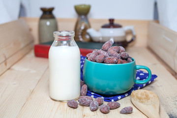 almonds  with milk on table.