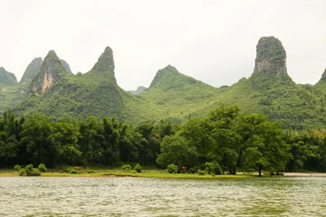Foto op Canvas Beautiful karst mountains li river © Juhku